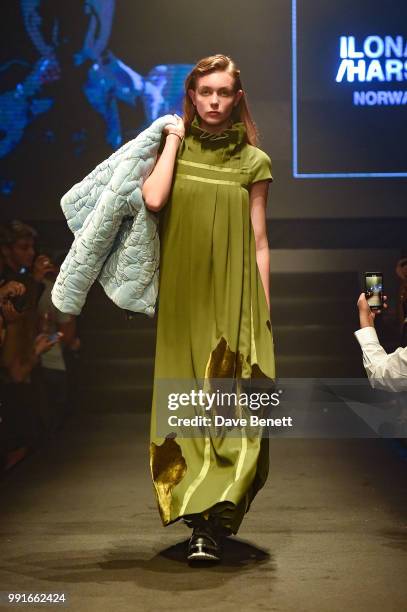 Model walks the runway wearing Ilona Hars, during Istituto Marangoni London 'Under The Light', a unique fashion performance to showcase the work of...