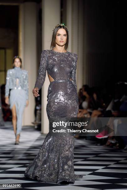 Alessandra Ambrosio walks the runway during the Zuhair Murad Haute Couture Fall Winter 2018/2019 show as part of Paris Fashion Week on July 4, 2018...