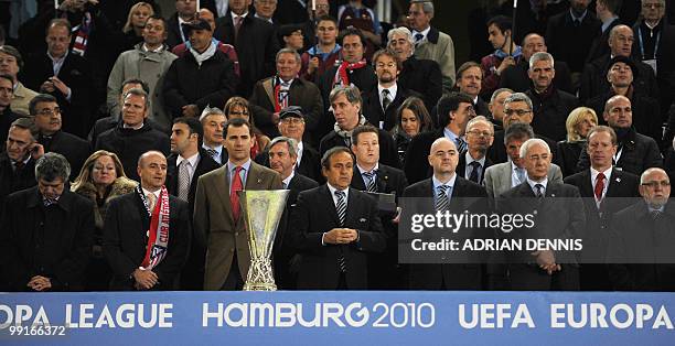 Spain's Prince Felipe and UEFA President Michel Platini prepare to present the trophy after the final football match of the UEFA Europa League Fulham...