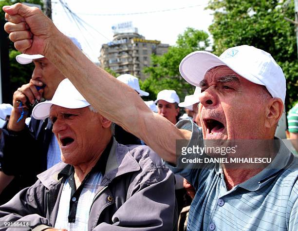 Romanian demonstrators shouts anti governmental slogans against the government's planned austerity measures in the front of the Romanian Government...
