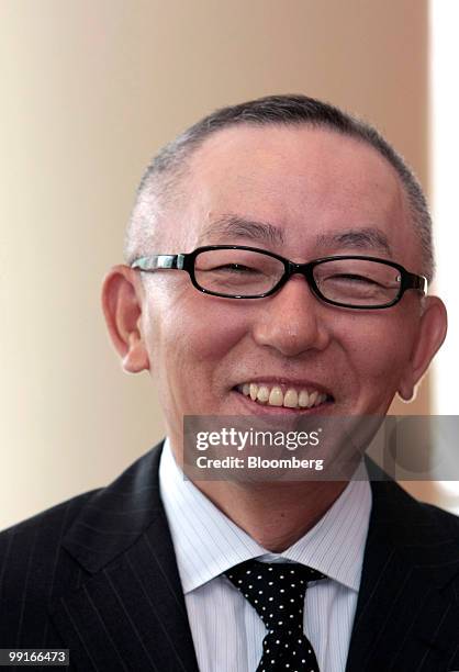 Tadashi Yanai, chairman, president and chief executive officer of Fast Retailing Co., poses for a photograph during a conference in Shanghai, China,...