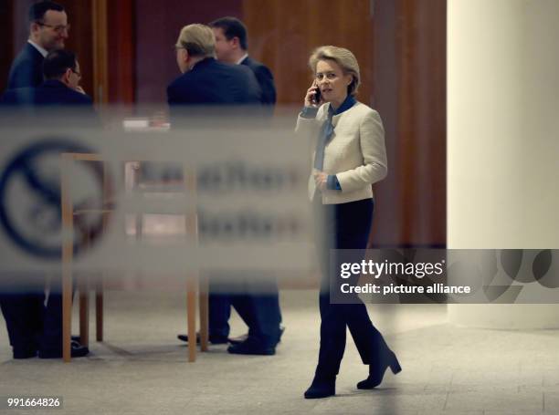 German Defence Minister Ursula von der Leyen can be seen in the hallway of the representative office of the state of Baden-Wurttemberg during a...