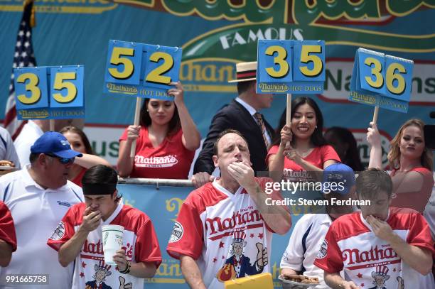 Matt Stonie, Joey Chestnut, and Carmen Cincotti compete in the Nathan's Hot Dog Eating Contest on July 4, 2018 in the Coney Island neighborhood of...