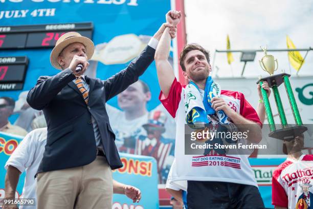 Carmen Cincotti earns second place after eating 64 hot dogs in the 2018 Nathan's Hot Dog Eating Contest on July 4, 2018 in the Coney Island...