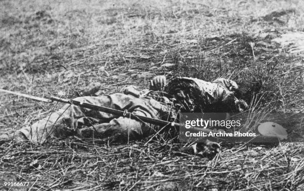 Dead soldier with his rifle fallen across his body after the battle of Gettysburg, Pennsylvania on 1 July 1863.