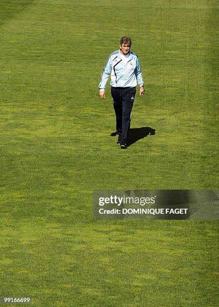 Real Madrid's coach Manuel Pellegrini attends a training session four days before their last match of the season against Malaga in Madrid on May 13,...