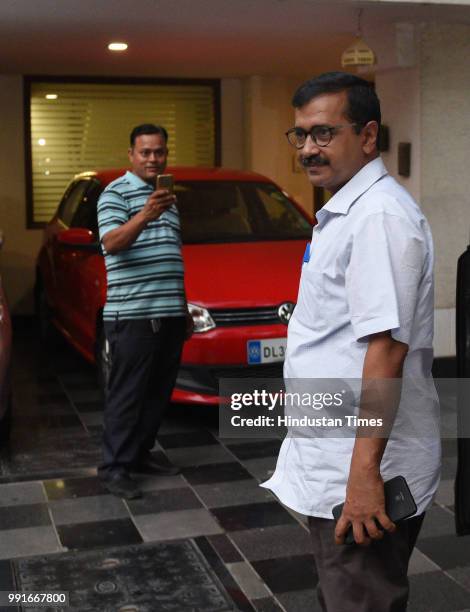 Delhi Chief Minister Arvind Kejriwal arrives to meet Delhi government lawyer P Chidambaram after Supreme Court ruled in favour of the Aam Aadmi Party...