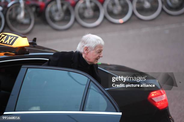 The former owner of the chain of chemist shops Schlecker, Anton Schlecker, steps out of a black taxi on arrival at the regional court in Stuttgart,...