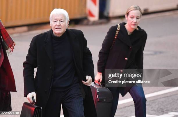 The former owner of the chain of chemist shops Schlecker, Anton Schlecker , and his daughter Meike arrive at the regional court in Stuttgart,...