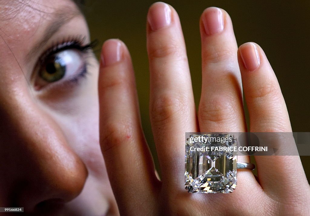 A model displays an extremely rare emera