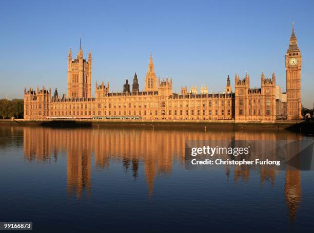 The Houses of Parliament are bathed in the early morning sunshine on May 13, 2010 in London, England. New Prime Minister David Cameron is holding his...