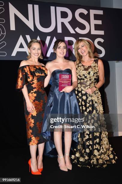 Emilia Clarke and Kate Garraway present the 'Student Nurse of the year' award to Kate Dutton during the 'Nurse of the Year' Awards 2018 at Park Plaza...