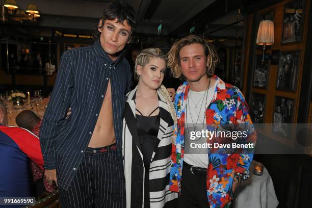 Kyle De'Volle, Kelly Osbourne and Dougie Poynter attend the Gay Times dinner hosted by Kyle De'Volle at The Ivy Market Grill on July 4, 2018 in...