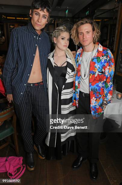 Kyle De'Volle, Kelly Osbourne and Dougie Poynter attend the Gay Times dinner hosted by Kyle De'Volle at The Ivy Market Grill on July 4, 2018 in...