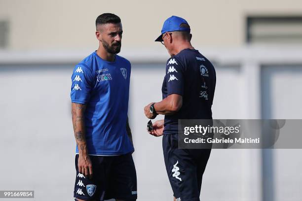 Aurelio Andreazzoli manager of Empoli FC and Francesco Caputo during first training session of the 2018/2019 season on July 4, 2018 in Empoli, Italy.