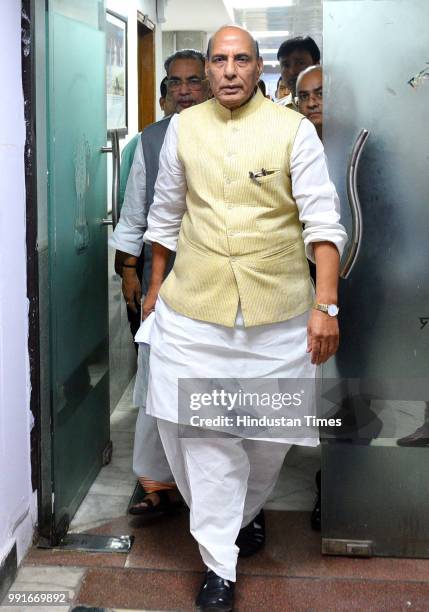 Union Home Minister Rajnath Singh with Agriculture Minister Radha Mohan Singh arrives for the media briefing about the cabinet meeting decisions at...