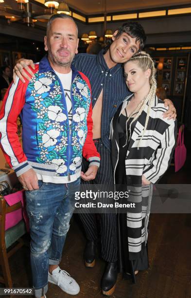 Fat Tony, Kyle De'Volle and Kelly Osbourne attend the Gay Times dinner hosted by Kyle De'Volle at The Ivy Market Grill on July 4, 2018 in London,...