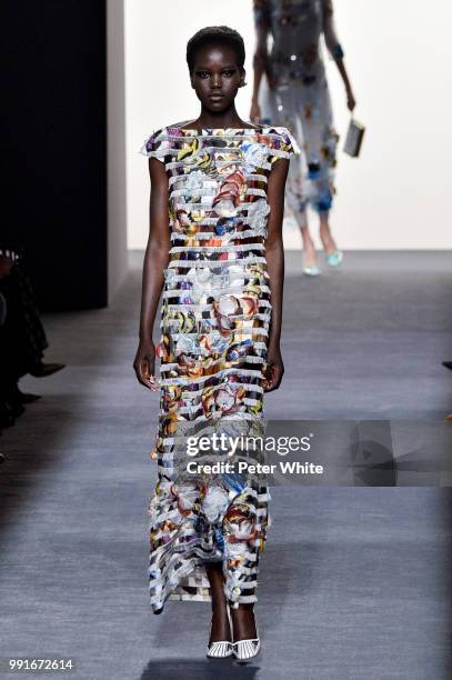 Model Adut Akech walks the runway during the Fendi Couture Haute Couture Fall Winter 2018/2019 show as part of Paris Fashion Week on July 4, 2018 in...