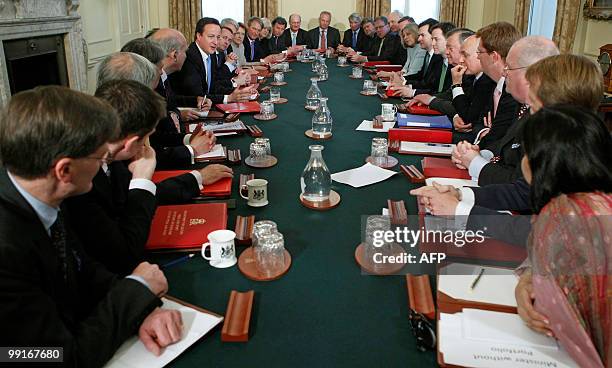 Britain's new Conserative Party Prime Minister, David Cameron , chairs the first Cabinet meeting of the new Conservative/Liberal Democrat coalition...