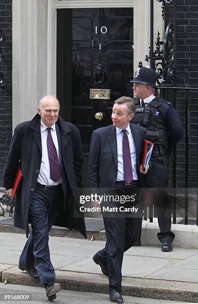 Business, Innovation and Skills Secretary Vince Cable and Education Secretary Michael Gove leave 10 Downing Street after the first Cabinet meeting of...