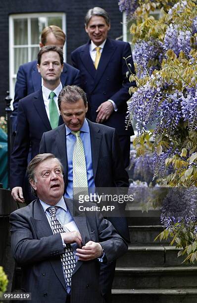 Britain's new Conserative Party Justice Secretary, Ken Clarke , leads felllow Conservative/Liberal Democrat coalition Cabinet members, including...