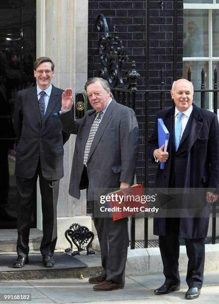 Attorney General Dominic Grieve, Justice Secretary Ken Clarke and Work and Pensions Secretary Iain Duncan Smith arrive at 10 Downing Street for the...