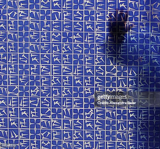 Girl looks through the window of the Herz Jesu church after a holy mass at the second day of the 2nd ecumenical Kirchentag on May 13, 2010 in Munich,...