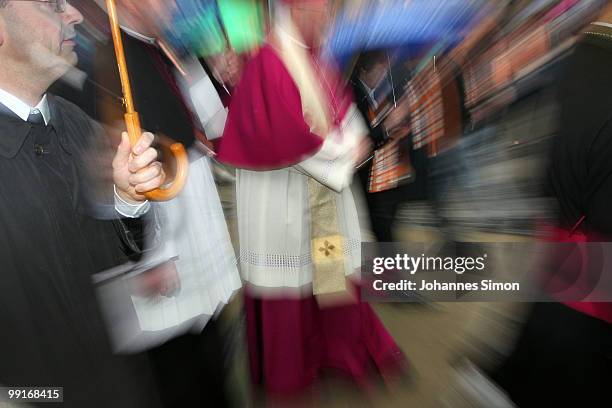 Catholic archbishop Reinhard Marx arrives for the central ecumenical mass of the 2nd Ecumenical Church Day at Odeonsplatz square on May 13, 2010 in...