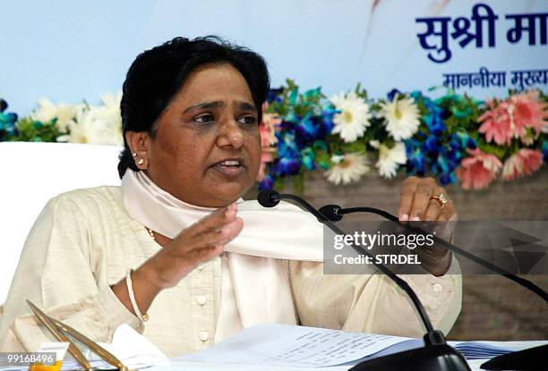 Chief Minister of the northern Indian state of Uttar Pradesh Mayawati gestures as she addresses a press conference in Lucknow on May 13, 2010....
