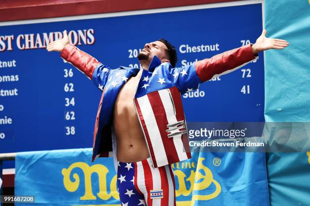 Contestants compete in the annual Nathan's Hot Dog Eating Contest on July 4, 2018 in the Coney Island neighborhood of the Brooklyn borough of New...