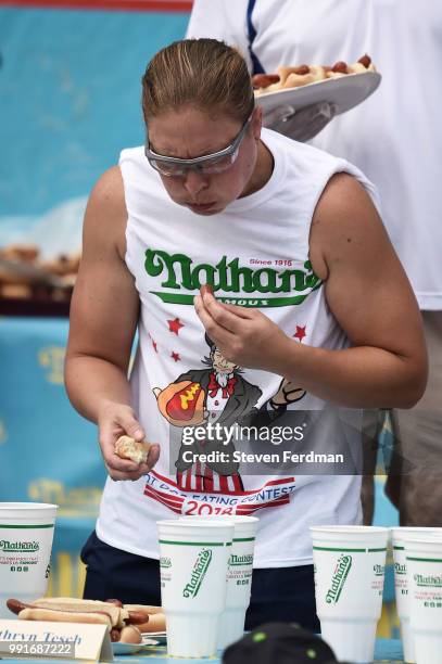 Kathryn Tesch competes in the women's annual Nathan's Hot Dog Eating Contest on July 4, 2018 in the Coney Island neighborhood of the Brooklyn borough...