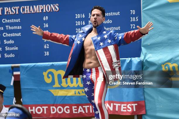 Contestants compete in the annual Nathan's Hot Dog Eating Contest on July 4, 2018 in the Coney Island neighborhood of the Brooklyn borough of New...