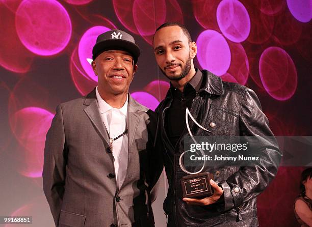 Russell Simmons and Swizz Beatz attend the 2010 SESAC New York Music Awards at the IAC Building on May 12, 2010 in New York City.