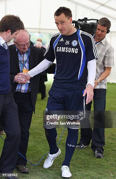 John Terry of Chelsea walks off after a training session at the Cobham training ground on May 13, 2010 in Cobham, England.