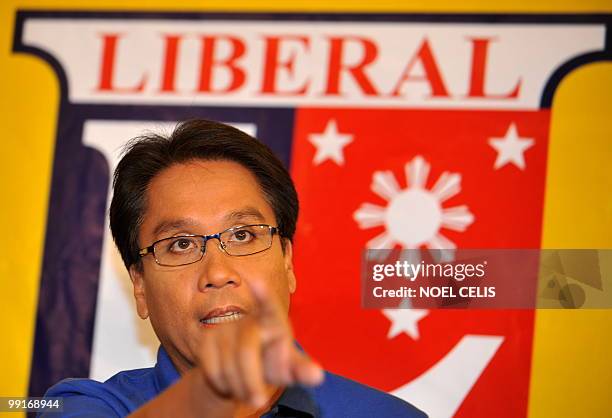 Liberal Party vice presidential candidate Manuel Roxas gestures during a press conference in Quezon City, east of Manila on May 13, 2010. Roxas is...
