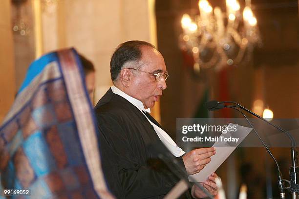 President Pratibha Patil administers the oath of office to the new Chief Justice of India Sarosh Homi Kapadia during a ceremony at the Presidential...