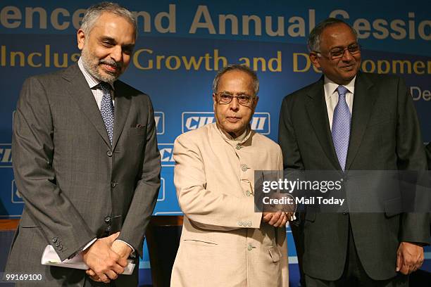 Union Finance Minister Pranab Mukherjee, CII President Venu Srinivasan and Hari Bhartiya at the CII National Conference and Annual Session 2010 in...