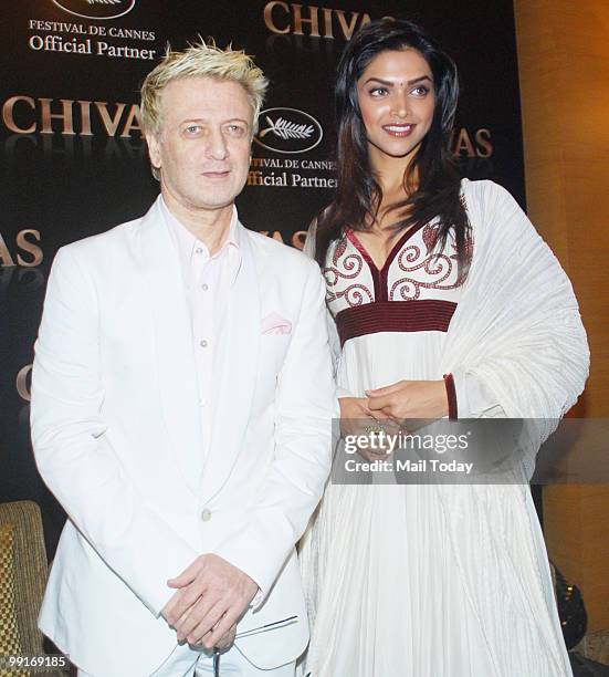 Deepika Padukone poses with designer Rohit Bal at a promotional event in Mumbai on May 12 ahead of a visit to The Cannes Film Festival.