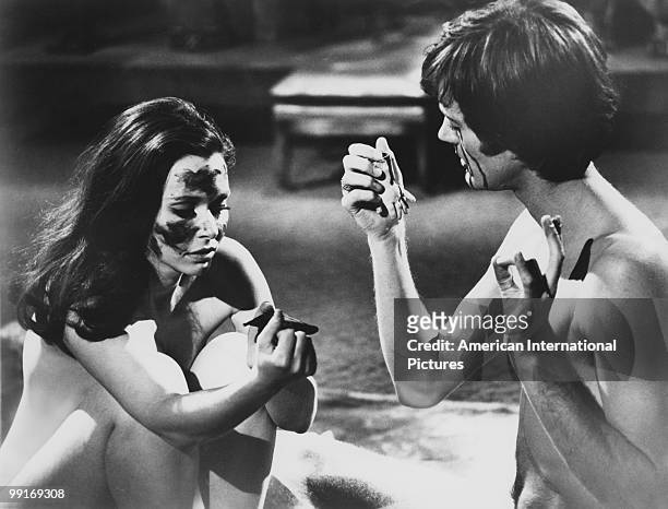 American actors Peter Fonda and Salli Sachse in a scene from 'The Trip', California, USA, 1966. The film was written by Jack Nicholson, directed by...
