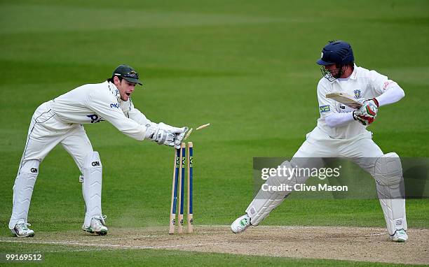 Chris Read of Nottinghamshire stumps Phil Mustard of Durham during day four of the LV County Championship match between Nottinghamshire and Durham at...