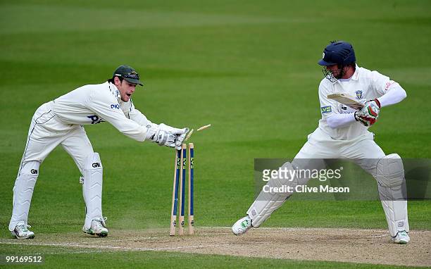 Chris Read of Nottinghamshire stumps Phil Mustard of Durham during day four of the LV County Championship match between Nottinghamshire and Durham at...