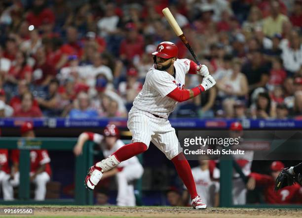 Carlos Santana of the Philadelphia Phillies in action against the Washington Nationals during a game at Citizens Bank Park on June 29, 2018 in...