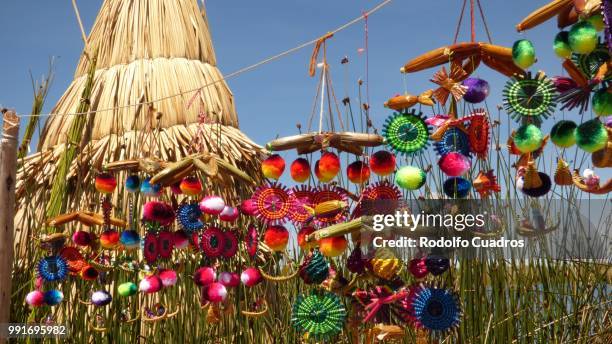 titicaca floating island colors - floating island stock pictures, royalty-free photos & images