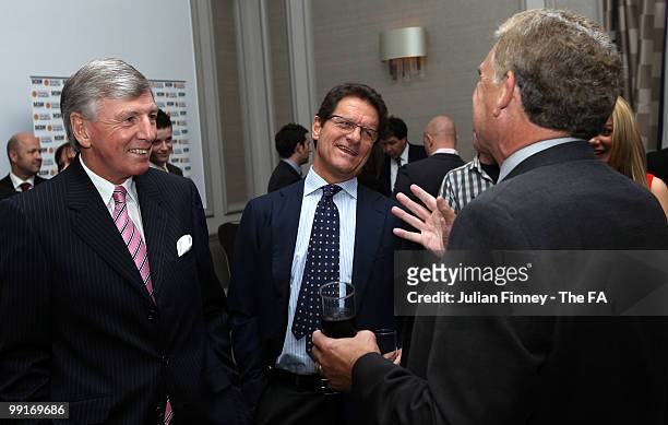 Martin Peters and Sir Trevor Brooking meet with Fabio Capello manager of England at the Grand Connaught Rooms on May 13, 2010 in London, England.