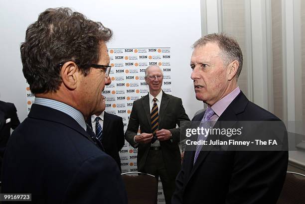 Sir Geoff Hurst talks with Fabio Capello manager of England at the Grand Connaught Rooms on May 13, 2010 in London, England.