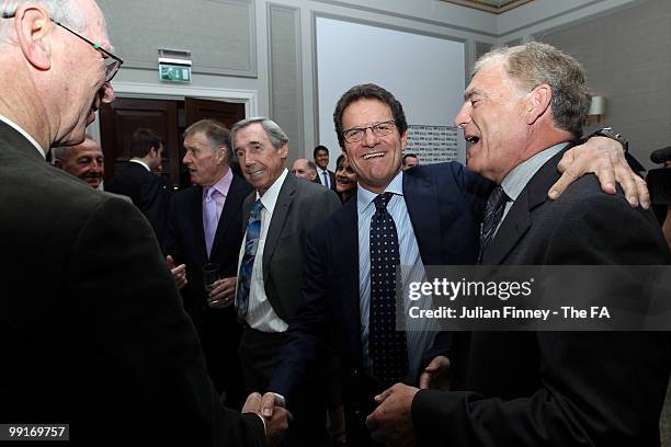 Fabio Capello manager of England greets Jack Charlton and Sir Trevor Brooking at the Grand Connaught Rooms on May 13, 2010 in London, England.