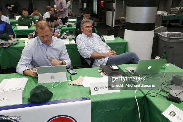 General Manager David Forst and Executive Vice President of Baseball Operations Billy Beane of the Oakland Athletics sit in the Athletics Draft Room...