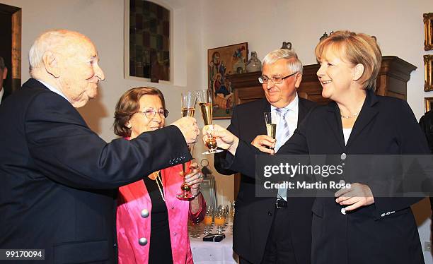 Germany Chancellor Angela Merkel visits former DFB president Egidius Braun at his home on May 13, 2010 in Aachen, Germany.