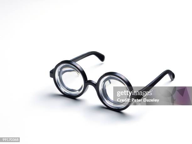 short sighted goggle glasses - horn rimmed glasses stock pictures, royalty-free photos & images