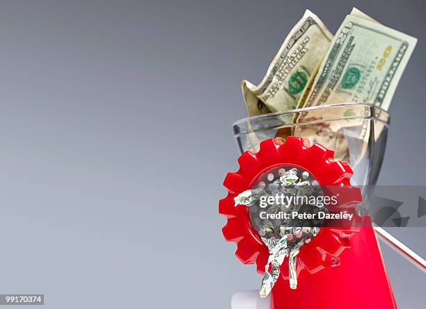dollar bills being minced destroyed  - peter dazeley stock pictures, royalty-free photos & images